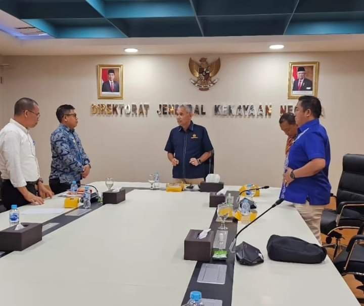 Pj Bupati Taput Dimposma Sihombing saat diterima Direktur DJKN Rional Silaban di Jakarta.   