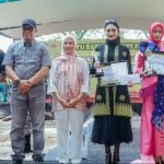 Pj. Nizhamul saat menghadiri Batu Bara Bangkit Fashion Week