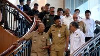 Gubernur Sumatera Utara (Sumut) Bobby Nasution didampingi Bupati Langkat Syah Afandin menghadiri Sosialisasi dan Implementasi Peraturan Menteri ESDM Nomor 14 Tahun 2025, di JW Marriot Hotel Jalan Puteri Hijau Medan