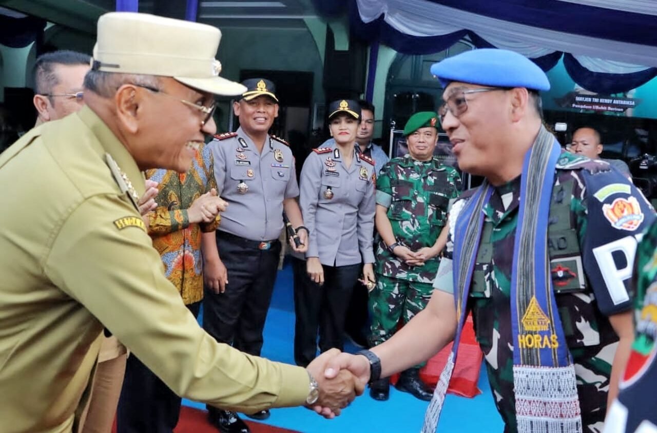 Bupati Simalungun saat sambut kunjungan kerja Dan Puspomad. 