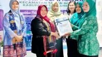 Tim Monitoring TP - Monitoring TP PKK Provinsi Sumatera Utara melakukan kunjungan ke Nagori Dolok Maraja.